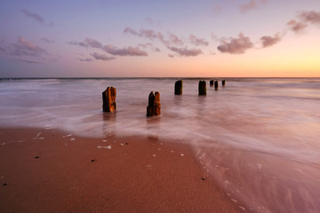 Morze Bałtyckie
,wschód słońca na plaży w Kołobrzegu,Polska. - obrazy, fototapety, plakaty