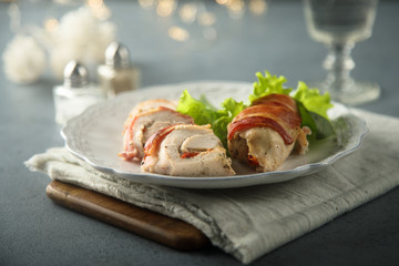 Chicken rolls with bacon, bell pepper and cheese
