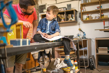 Father and Son Making a Birdhouse	
