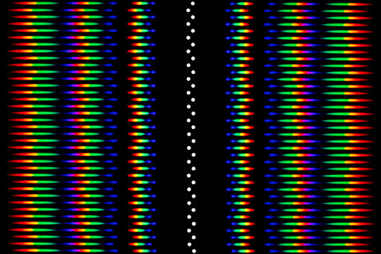 Photograph of a diffraction pattern from a double line of LEDs. Image was obtained using a diffraction grating. Diffraction pattern contains from -3 to +3 diffraction orders
