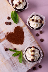 Love chocolate cupcake concept with various cream and decorations