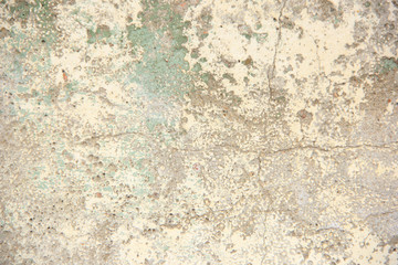 background old concrete block in holes.background cement wall in holes and paint residues