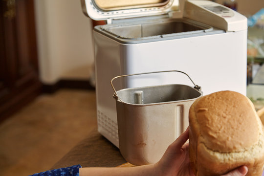 Hostess Keeps Fresh Bread From Electric Bread Maker