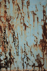 background rusty iron wall with blue paint texture with cracks