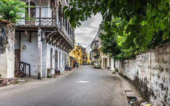 The narrow street leads to the old port in Mombasa