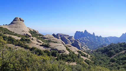 Naklejka premium Monserat Mountains in Catalonia. Spain. The rocky mountains of Moncerat rise above the Catalan lands.