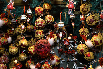 Christmas decorations on the market in Vienna.Golden balls, bulbs, bubbles,decorations and ornaments