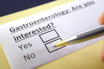 Obraz premium One person is answering question about gastroenterology.