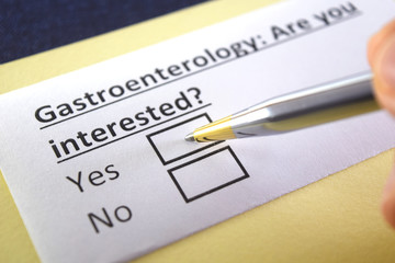 Obraz premium One person is answering question about gastroenterology.