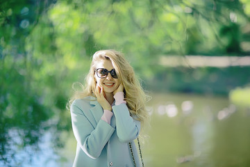 smile girl outdoor / summer fun picture adult model girl, happiness, the concept of a good mood, smiling face girl