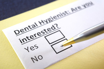 Obraz premium One person is answering question about dental hygiene.