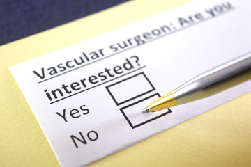 Obraz premium One person is answering question about vascular surgeon.