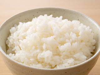 Rice on a wooden background