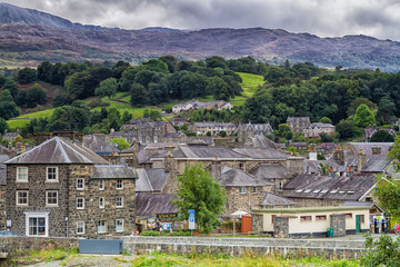 DOLGELLAU, WALES - AUGUST 30, 2016: Old stone house by the road in Snowdonia National Park,...