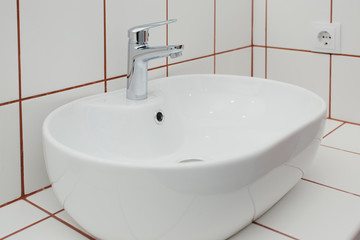 white washbasin in the bathroom