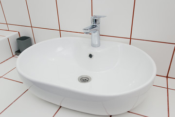 white washbasin in the bathroom