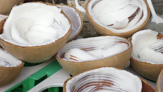 Close Up of Coconut Halves with Pulp for Ice Cream at the Tourist Market in Thailand
