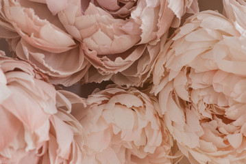 The texture of decorative flowers close up. Artificial flowers with large texture.  Photo zone with large artificial flowers. 