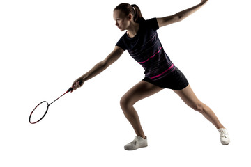 Pretty woman playing badminton over white background