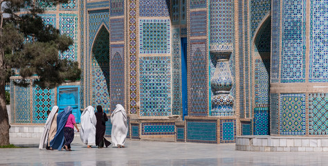 Mazar-e Sharif, Afghanistan, May 2004: Women in burqas at he Blue Mosque in Mazar-e Sharif