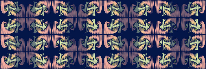 Colorful Ikat ornamentel seamless pattern for textile, wallpaper, card or wrapping paper