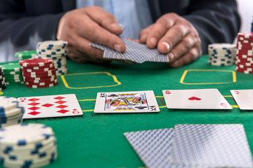 Naklejka premium Gambling concept man play poker at casino