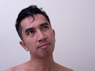 Fototapeta premium Young handsome man taking a bath