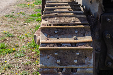caterpillar. wide chain worn on tractor wheels