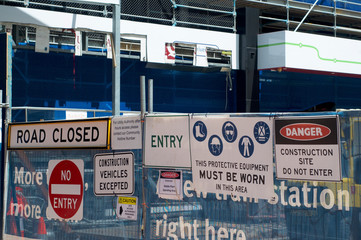 Various warning signs on construction site