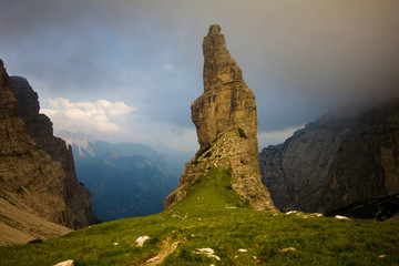 Fototapeta na wymiar The Campanile di Val Montanaia is a rock tower surrounded by the mountains in Friuli, Italy