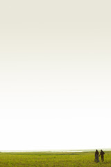 couple walking in open sky