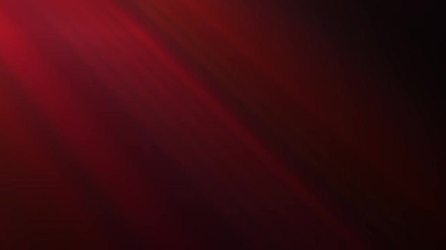 Abstract background with red rays on a dark background
