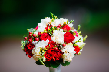 Wedding bouquet in the park. Bouquet of delicate flowers.