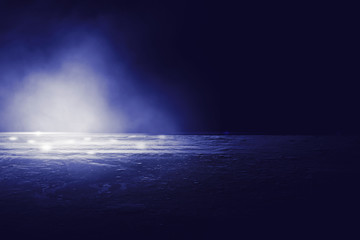 Empty background scene. rays of searchlights, neon blue and purple  light, highlights and lights. Night view of the scene. Dark background with spotlights.