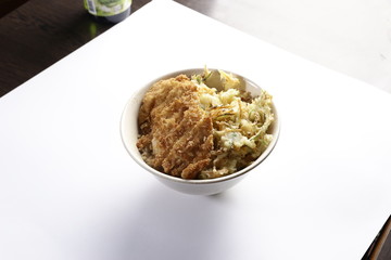 Rice in a bowl with chicken