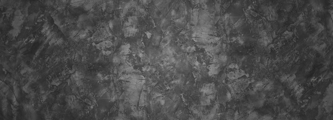 Fototapeta na wymiar Dark gray wall with concrete texture and vignette as a background or wallpaper for studio display your products.