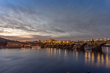 Charles Bridge Prague, leading to Prague Castle at night.