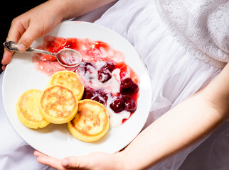 Obraz na płótnie Canvas Healthy breakfast - cottage cheese pancakes, syrniki.