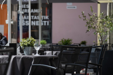 Empty tables and chairs. Covid or Coronavirus affects the global food industry, restaurants and bar daily traffic dropped