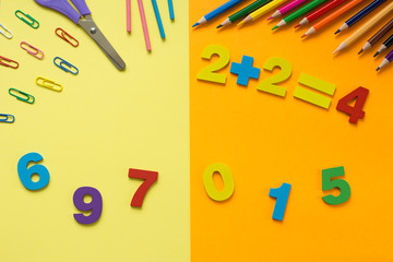 set of school supplies and wooden numbers