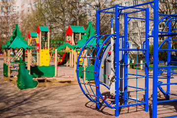 Closed children's playground. COVID-19 security and protection measures in the city par