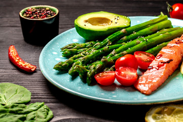 Buddha dish with Grilled salmon and asparagus. Close up. Detox and healthy superfoods concept. Overhead, top view, flat lay