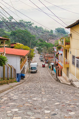 Cars parked on the street, Copan Ruinas, Honduras, Central America