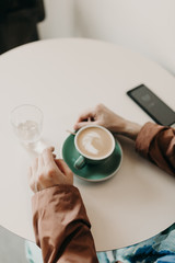 man with a cup of coffee
