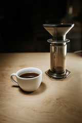 coffee maker and coffee cup