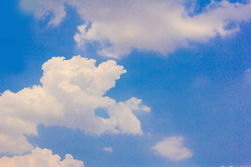 Blue sky background with clouds.