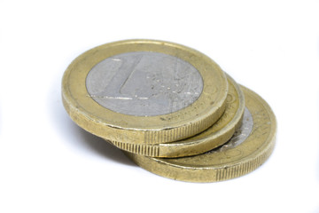 One euro coins with white background