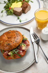 Burger sandwich with  prosciutto, cream cheese