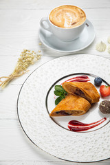 
Apple pie with berries on a white background
