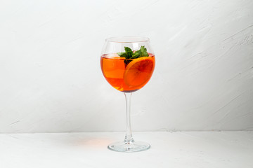 Sweet appetizing aperol spritz fruit cocktail